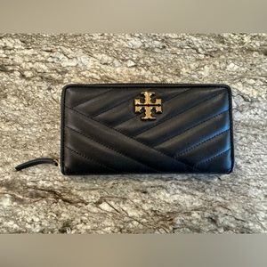 Tory Burch KIRA CHEVRON ZIP CONTINENTAL
WALLET. Never been used!